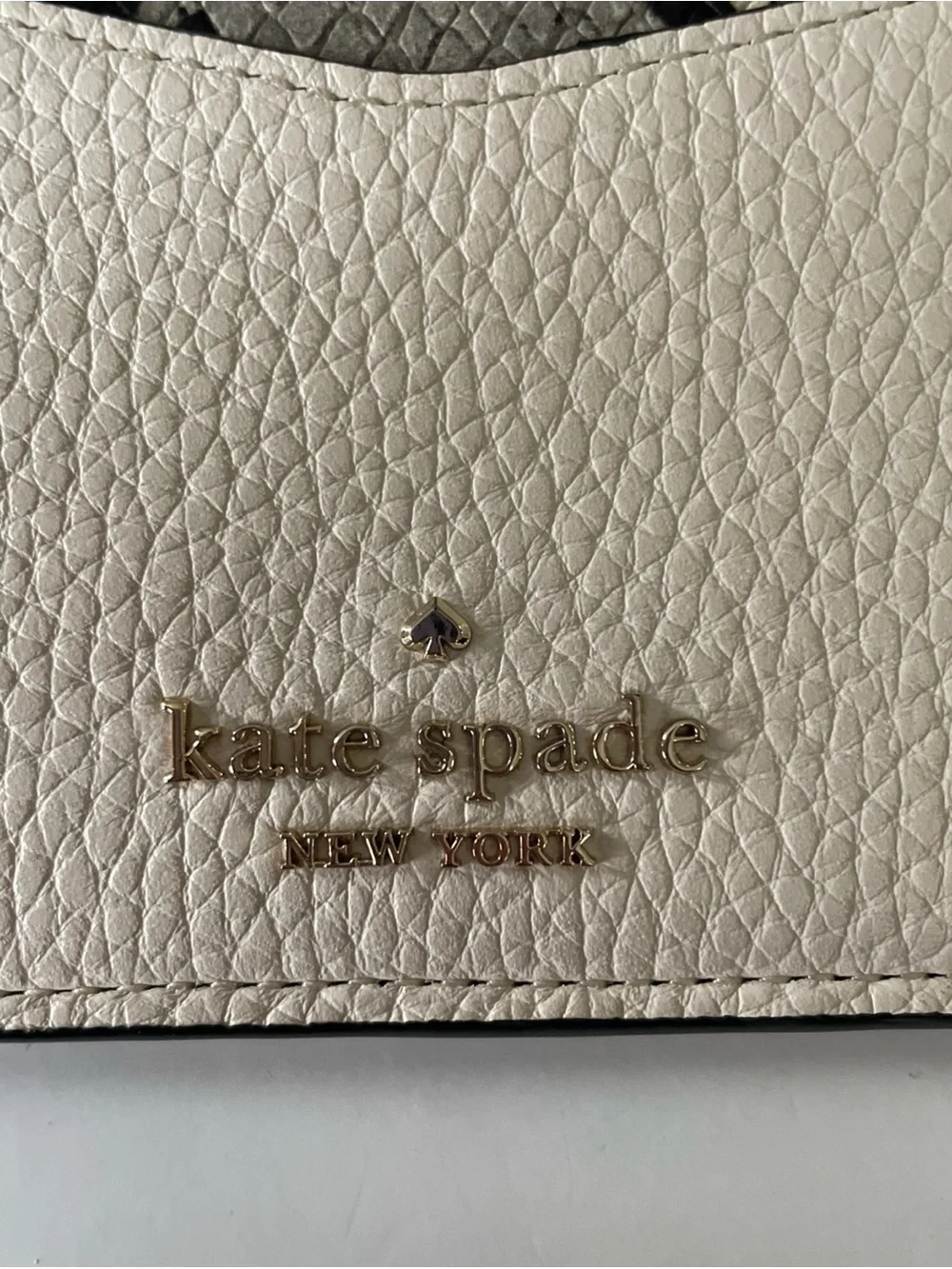 kate spade Cream Pebbled Wristlet with Snake-Print Trim